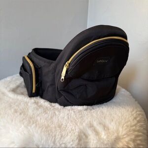 Tushbaby black with gold hip baby and toddler carrier
